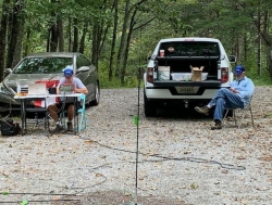 Phillip (KQ4ETC) keeps the calls coming in while Bob (KE4QCY) takes in the beauty of this unique location.
