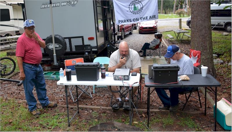 Really nice activation site with Danny's camper.  Michelle watching the football game while the boys make contacts.