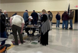 Eager crowd searching for stuff.